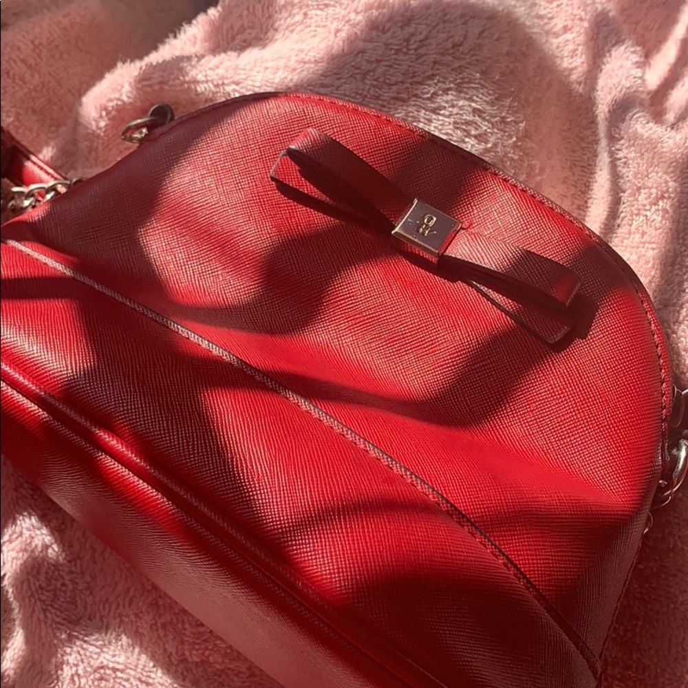 Red hand purse